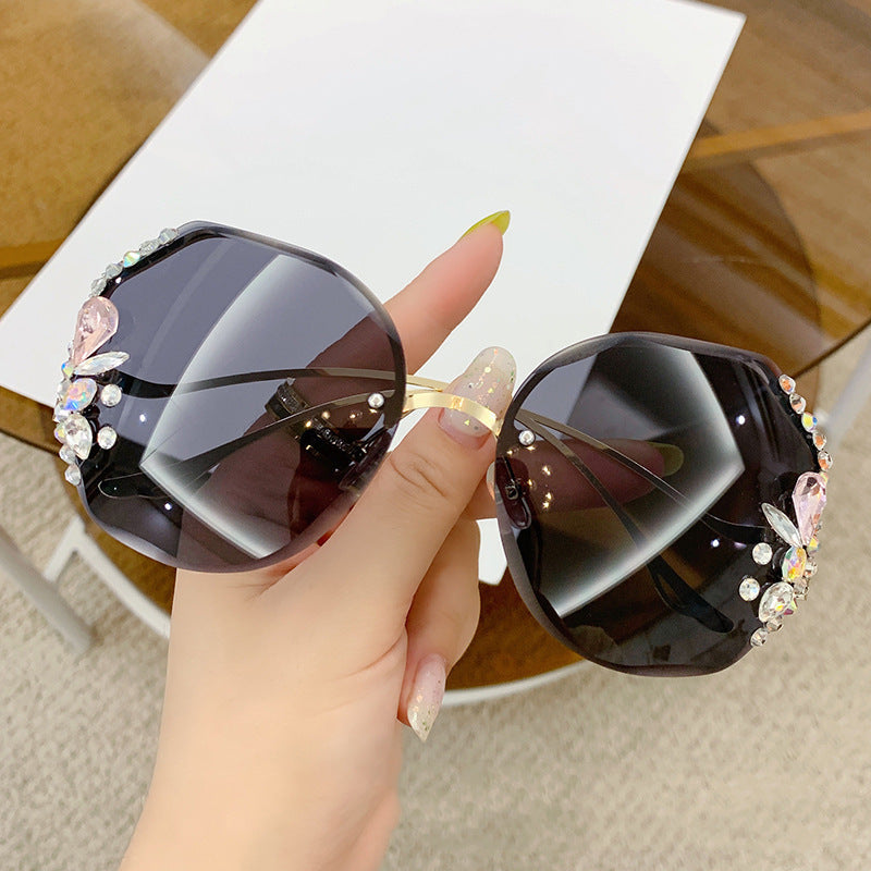 Women's titanium UV400 rhinestone sunglasses